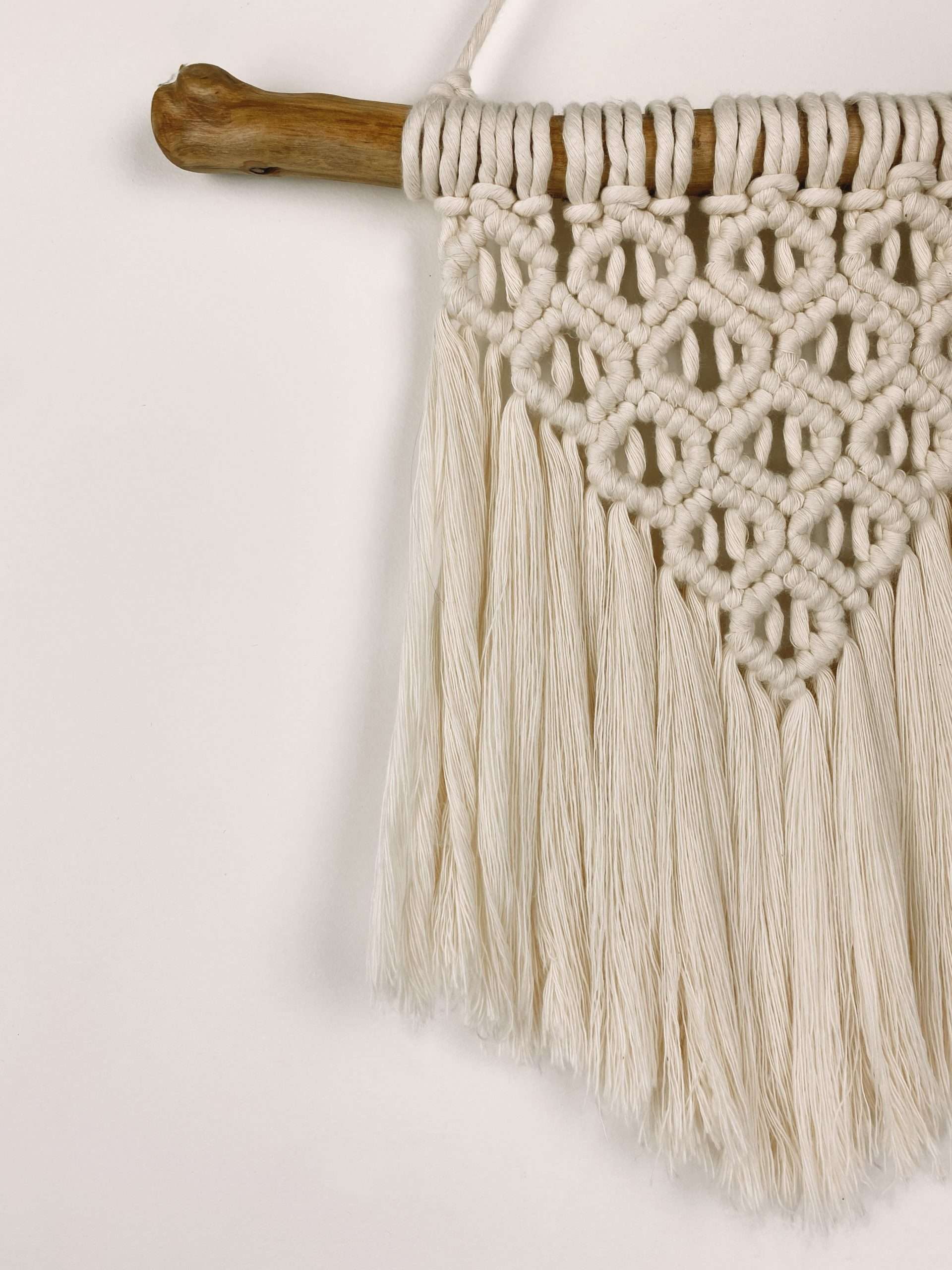 Peça de macramé Sunrise