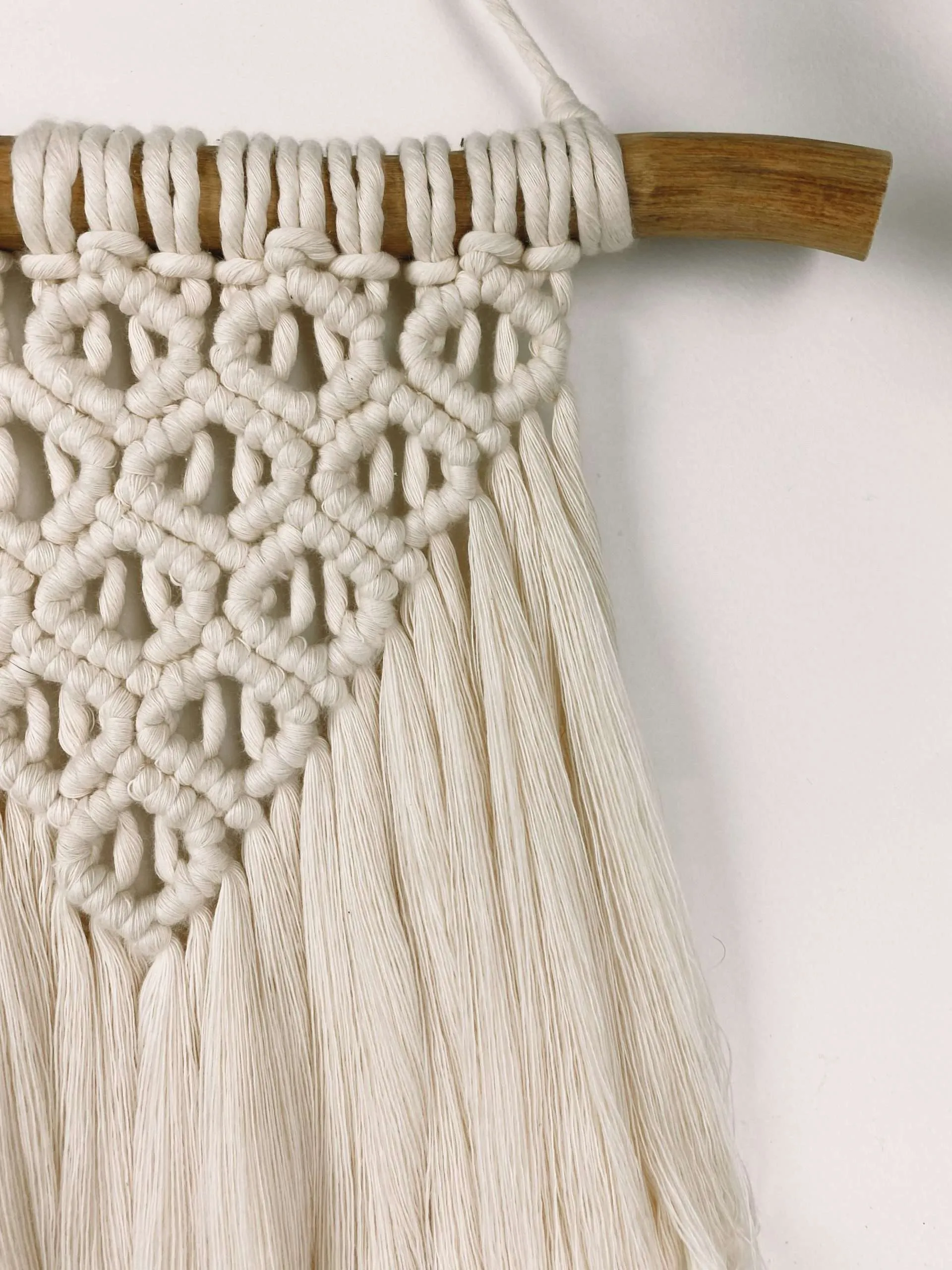Peça de macramé Sunrise