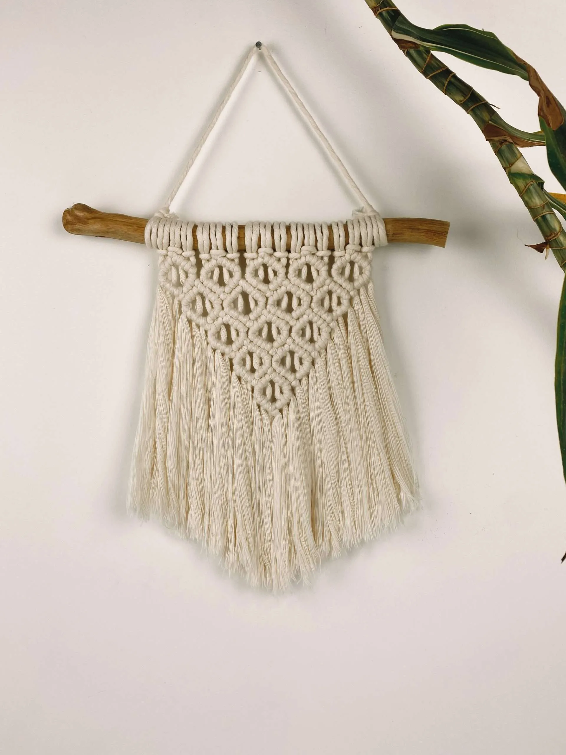Peça de macramé Sunrise