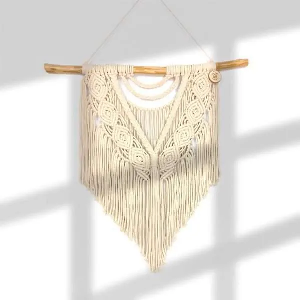 Painel de parede em macramé Salt com arcos de cordão e desenho de folhas, com sombra de janela